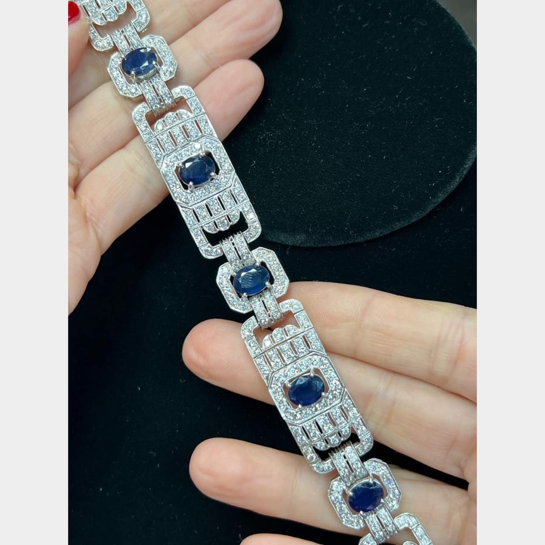 18K White Gold Sapphire Diamond Bracelet 20 Ct Sapphires 10 Ct Diamonds: 18K White Gold Sapphire Diamond Bracelet 20 Ct Sapphires 10 Ct Diamonds This exquisite 18K White Gold Bracelet features a stunning combination of sapphires and diamonds. Weighing 40.5 grams, it is