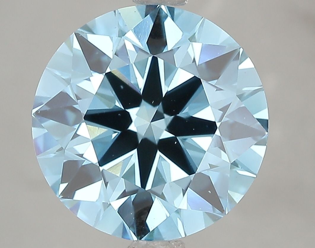 Ideal Loose Diamond - ROUND 5.02ct Fancy Vivid Blue VS1: Ideal Loose Diamond - ROUND 5.02ct Fancy Vivid Blue VS1 Source: This is a real non-mined Diamond that has been grown in a lab Shape: ROUND Carats: 5.02 Color: Fancy Vivid Blue Certification: IGI Video