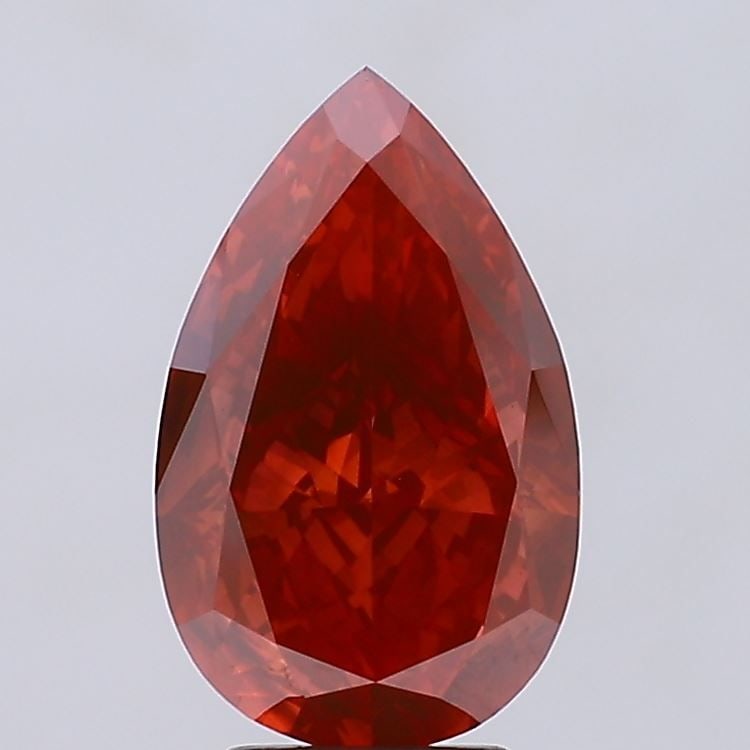 Loose Diamond - PEAR 5.55ct Fancy Vivid Red VS1: Loose Diamond - PEAR 5.55ct Fancy Vivid Red VS1 Source: This is a real non-mined Diamond that has been grown in a lab Shape: PEAR Carats: 5.55 Color: Fancy Vivid Red Certification: NONE Video: Video