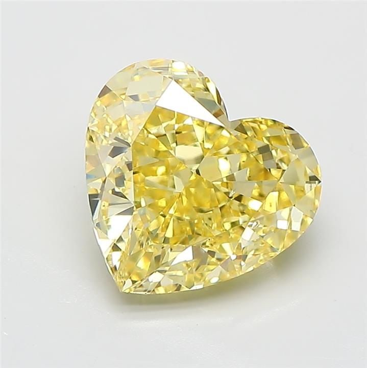 Loose Diamond - HEART 3.11ct Fancy Vivid Yellow VS2: Loose Diamond - HEART 3.11ct Fancy Vivid Yellow VS2 Source: This is a real non-mined Diamond that has been grown in a lab Shape: HEART Carats: 3.11 Color: Fancy Vivid Yellow Certification: IGI Video: