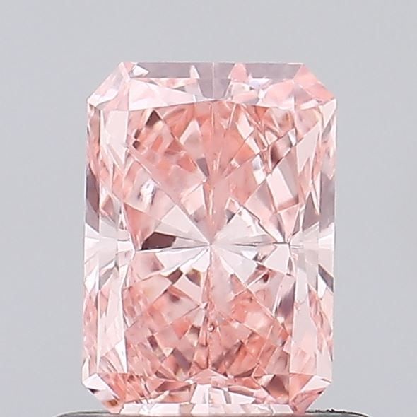 Loose Diamond - RADIANT 0.71ct Fancy Vivid Pink VVS2: Loose Diamond - RADIANT 0.71ct Fancy Vivid Pink VVS2 Source: This is a real non-mined Diamond that has been grown in a lab Shape: RADIANT Carats: 0.71 Color: Fancy Vivid Pink Certification: IGI Video:
