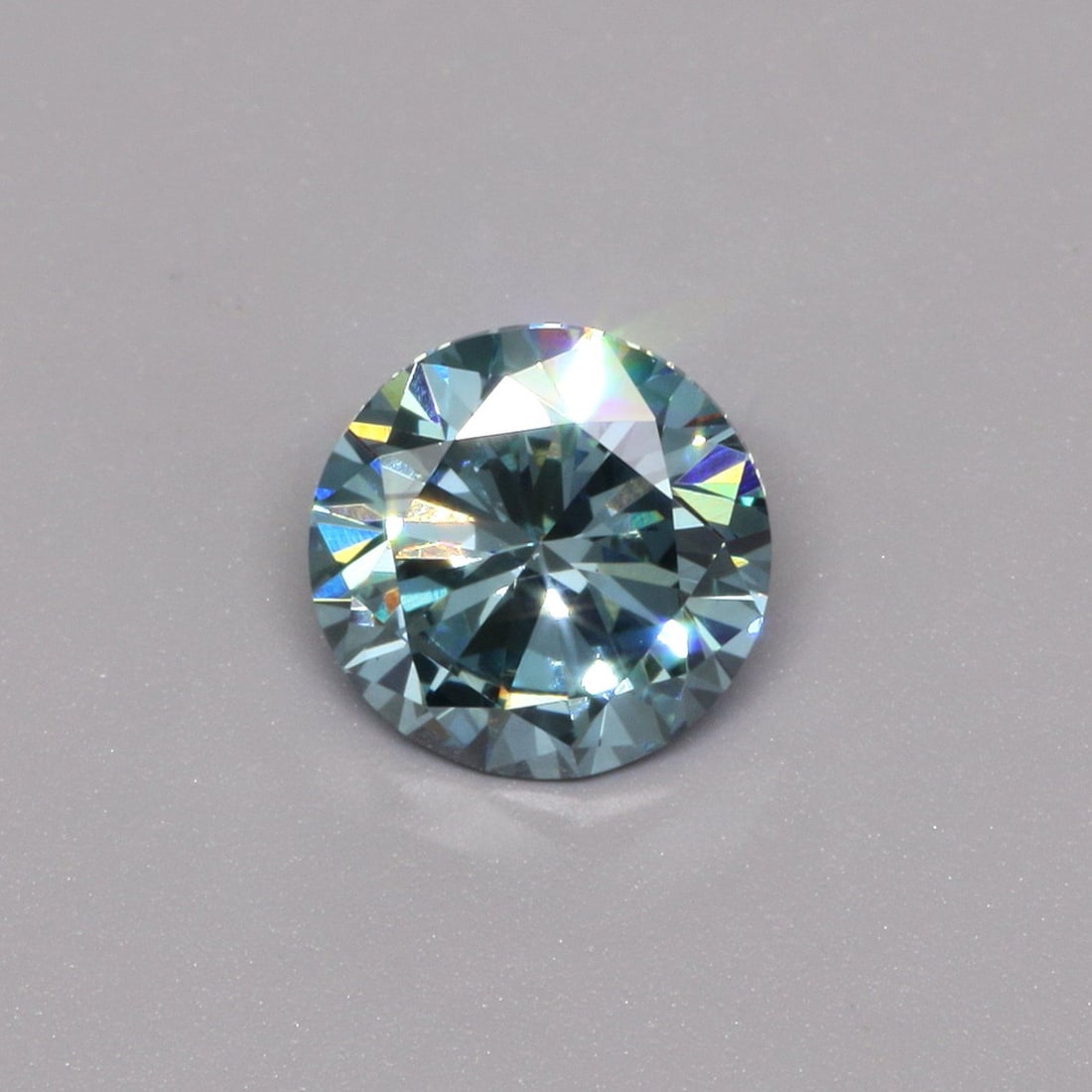 Loose Diamond - ROUND 1.1ct Fancy Vivid Blue VS1: Loose Diamond - ROUND 1.1ct Fancy Vivid Blue VS1 Source: This is a real non-mined Diamond that has been grown in a lab Shape: ROUND Carats: 1.1 Color: Fancy Vivid Blue Certification: IGI Video: