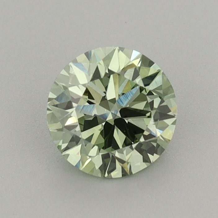 Ideal Loose Diamond - ROUND 0.71ct Fancy Vivid Green VS1: Ideal Loose Diamond - ROUND 0.71ct Fancy Vivid Green VS1 Source: This is a real non-mined Diamond that has been grown in a lab Shape: ROUND Carats: 0.71 Color: Fancy Vivid Green Certification: IGI Vid