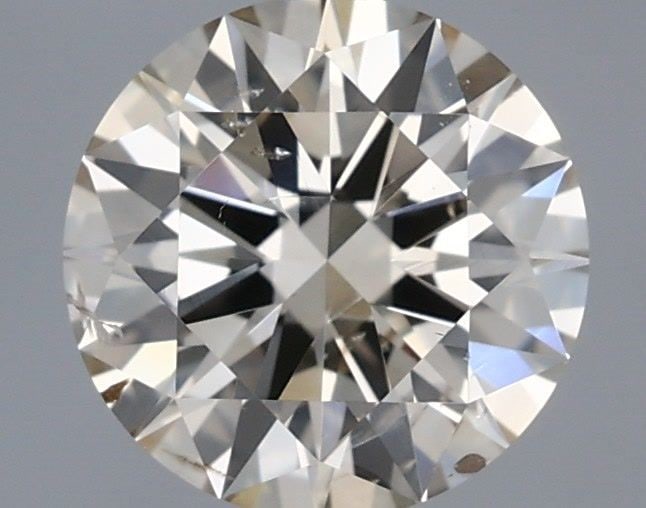 Loose Diamond - ROUND 0.65ct Very Light Brown SI2: Loose Diamond - ROUND 0.65ct Very Light Brown SI2 Source: Natural Shape: ROUND Carats: 0.65 Color: Very Light Brown Certification: IGI Video: