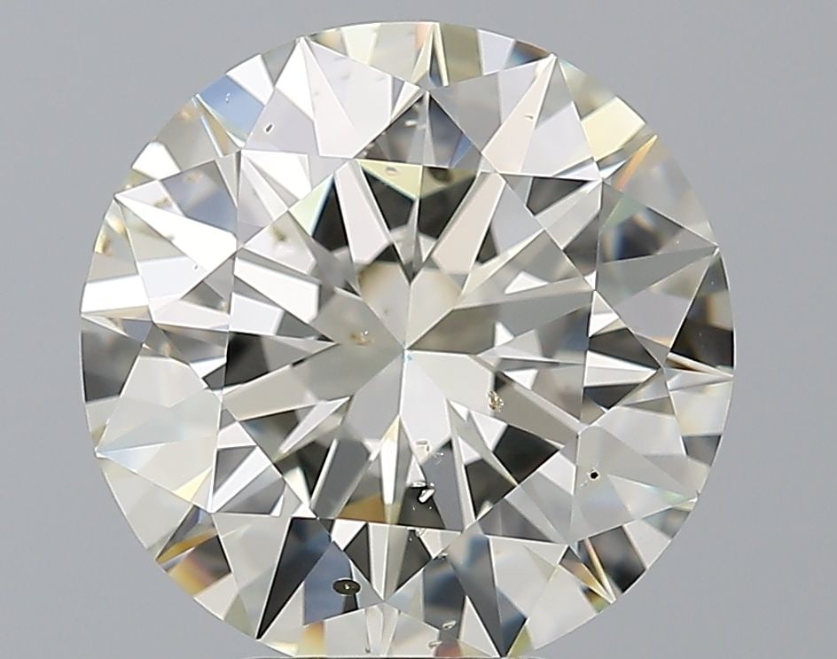 Loose Diamond - ROUND 5.01ct L SI2: Loose Diamond - ROUND 5.01ct L SI2 Source: Natural Shape: ROUND Carats: 5.01 Color: L Clarity: SI2 Certification: GIA The Diamond Depot Guarantee: All items in this auction are guaranteed to be 100% a