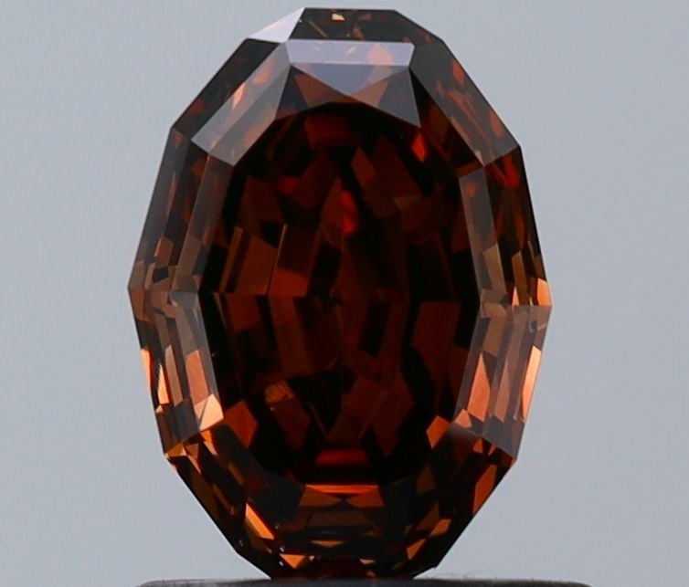 Loose Diamond - OVAL 1.02ct Fancy Dark Orangey Brown VS2: Loose Diamond - OVAL 1.02ct Fancy Dark Orangey Brown VS2 Source: Natural Shape: OVAL Carats: 1.02 Color: Fancy Dark Orangey Brown Certification: GIA Video: Video Link The Diamond Depot Guarantee: All