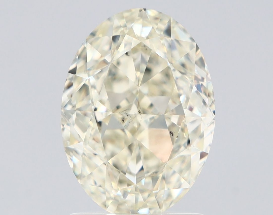 Loose Diamond - OVAL 2.1ct O-P SI1: Loose Diamond - OVAL 2.1ct O-P SI1 Source: Natural Shape: OVAL Carats: 2.1 Color: O-P Certification: GIA Video: Video Link The Diamond Depot Guarantee: All items in this auction are guaranteed to be