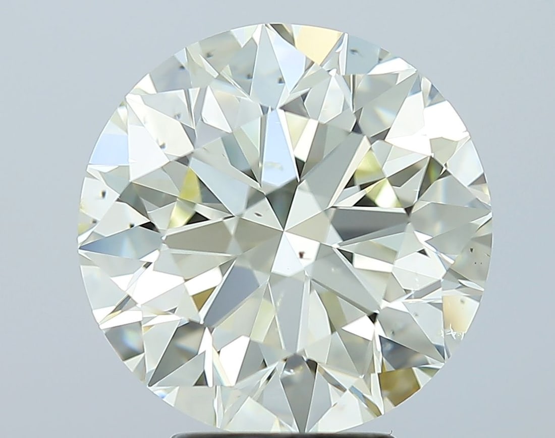 Loose Diamond - ROUND 4.56ct O-P SI1: Loose Diamond - ROUND 4.56ct O-P SI1 Source: Natural Shape: ROUND Carats: 4.56 Color: O-P Certification: GIA Video: