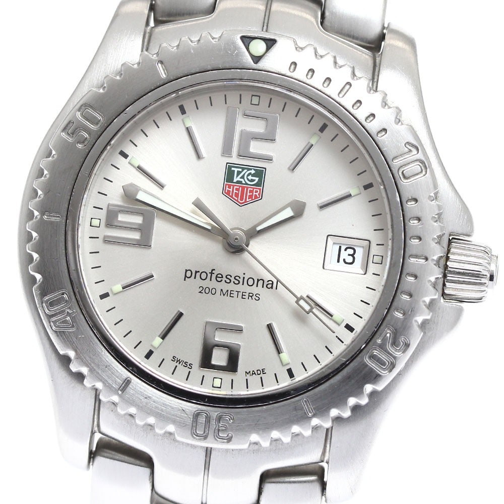 Tag Heuer Link WT1212 Stainless Steel Quartz Date Watch: Tag Heuer Link WT1212 Stainless Steel Quartz Date Watch This TAG HEUER Link Date Quartz men's wristwatch features a stainless steel case and bracelet with a silver dial. The watch is equipped with a d