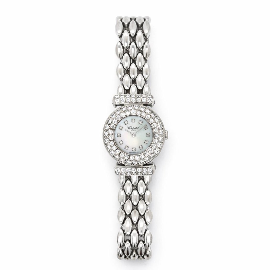 Chopard Ladies Quartz Watch 18K White Gold Mother of Pearl Dial Diamonds: Chopard Ladies Quartz Watch 18K White Gold Mother of Pearl Dial Diamonds This elegant Chopard ladies watch is crafted from 18K white gold and features a 21mm case. The timepiece is adorned with approx