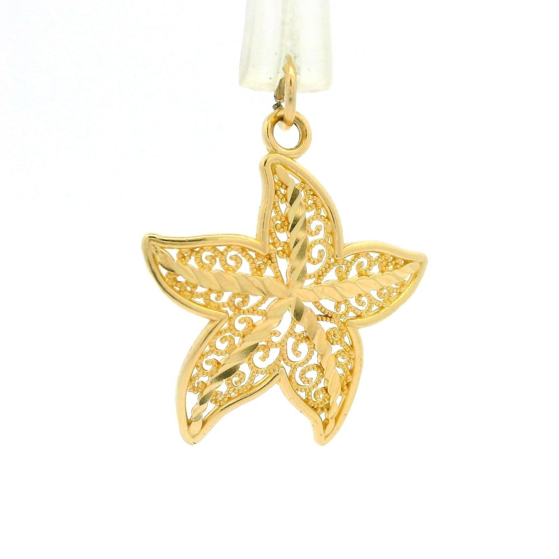 14k Yellow Gold Textured Starfish Charm Pendant Estate Collectible: 14k Yellow Gold Textured Starfish Charm Pendant Estate Collectible This exquisite estate collectible charm pendant features an intricate open work textured design of a starfish, beautifully crafted fr