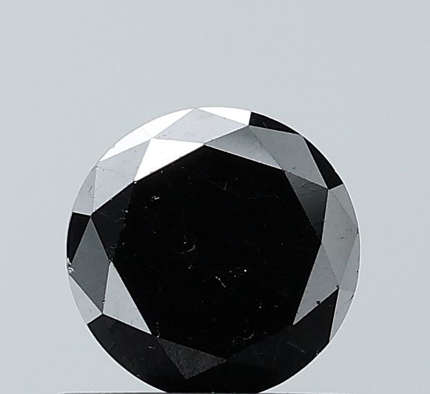 Loose Diamond - ROUND 0.83ct Fancy Black VS2: Loose Diamond - ROUND 0.83ct Fancy Black VS2 Source: Natural Shape: ROUND Carats: 0.83 Color: Fancy Black Certification: NONE Video: