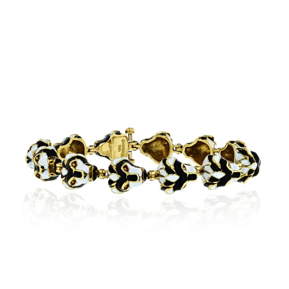 David Webb Lion Head Bracelet Platinum 18K Yellow Gold 12 Motifs Enamel: David Webb Lion Head Bracelet Platinum 18K Yellow Gold 12 Motifs Enamel This exquisite David Webb bracelet features a striking combination of platinum and 18K yellow gold. Crafted with 12 motifs depic