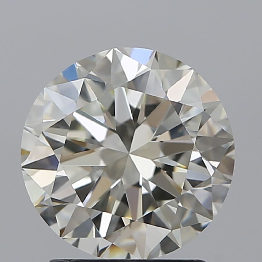 Loose Diamond - ROUND 2.01ct J VVS1: Loose Diamond - ROUND 2.01ct J VVS1 Source: Natural Shape: ROUND Carats: 2.01 Color: J Clarity: VVS1 Certification: IGI Video: