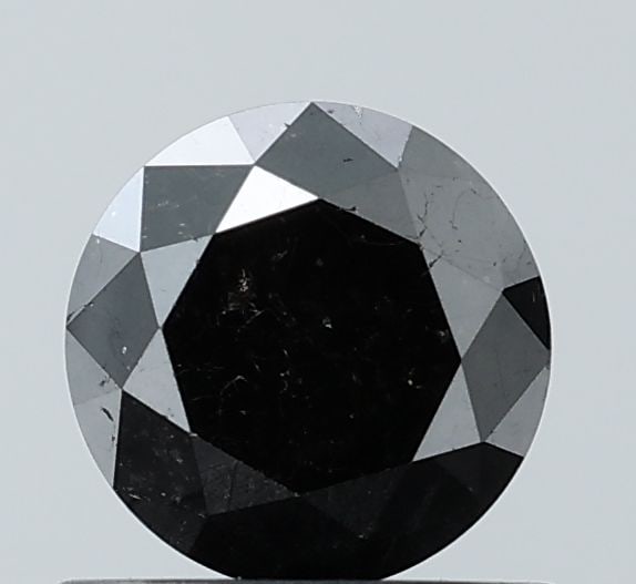 Loose Diamond - ROUND 0.92ct Fancy Black VS1: Loose Diamond - ROUND 0.92ct Fancy Black VS1 Source: Natural Shape: ROUND Carats: 0.92 Color: Fancy Black Certification: NONE Video: