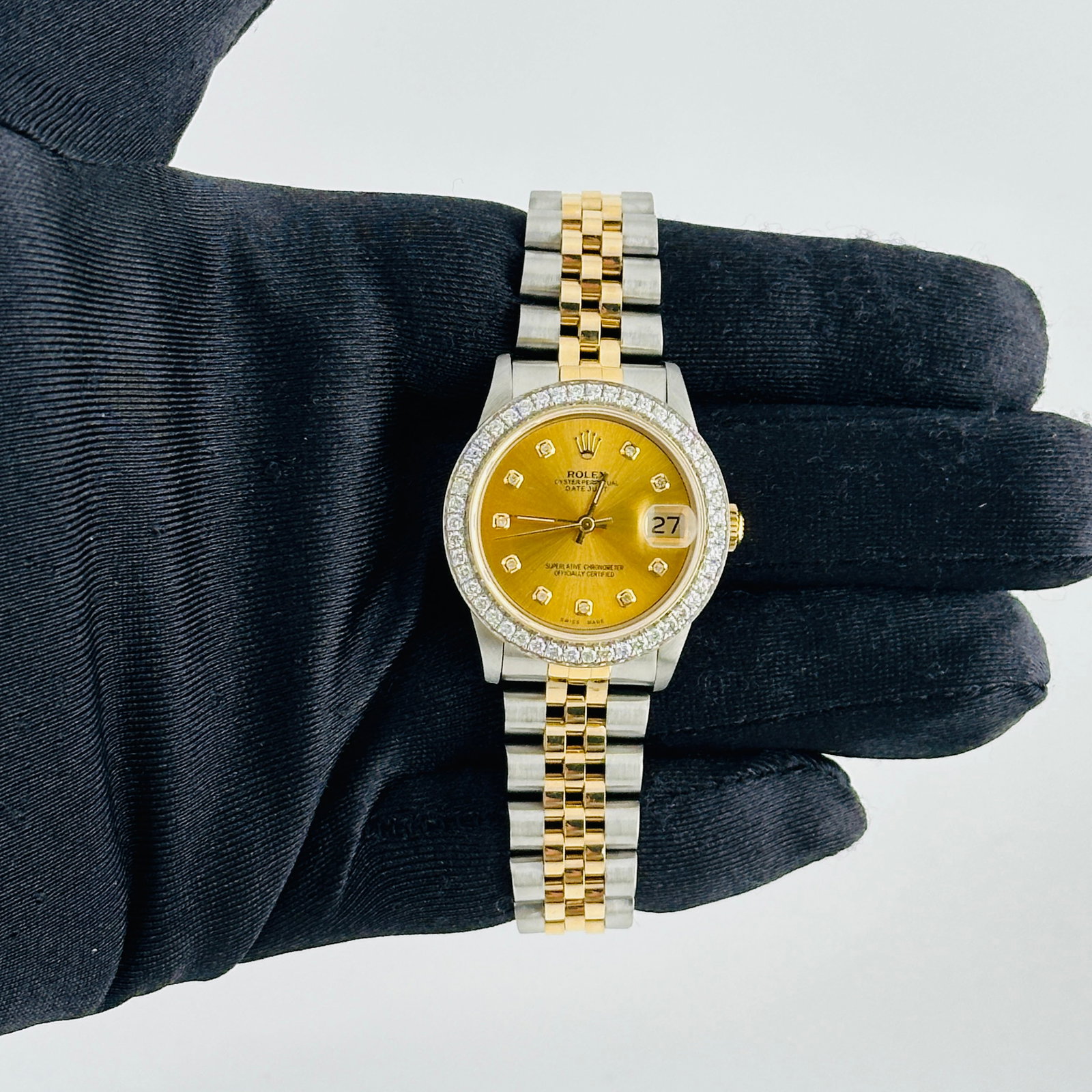 Ladies Datejust Ref 68273 Aftermarket Champagne Diamond Dial D Link Jubilee: Ladies Datejust Ref 68273 Aftermarket Champagne Diamond Dial D Link Jubilee This ladies' Rolex Datejust features an aftermarket champagne diamond dial and a D-Link Jubilee bracelet. The reference numb
