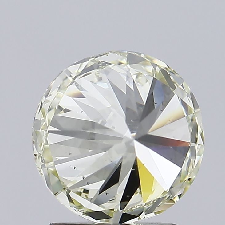 Loose Diamond - ROUND 2.01ct O-P VS2: Loose Diamond - ROUND 2.01ct O-P VS2 Source: Natural Shape: ROUND Carats: 2.01 Color: O-P Certification: GIA Video: