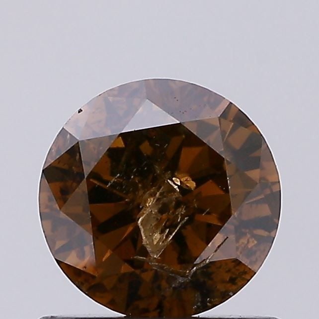 Loose Diamond - ROUND 0.63ct Fancy Brown I2: Loose Diamond - ROUND 0.63ct Fancy Brown I2 Source: Natural Shape: ROUND Carats: 0.63 Color: Fancy Brown Certification: NONE Video: