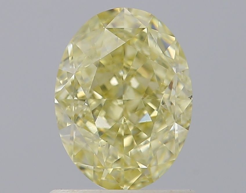 Loose Diamond - OVAL 1.09ct Fancy Light Yellow VS1: Loose Diamond - OVAL 1.09ct Fancy Light Yellow VS1 Source: Natural Shape: OVAL Carats: 1.09 Color: Fancy Light Yellow Certification: IGI Video: