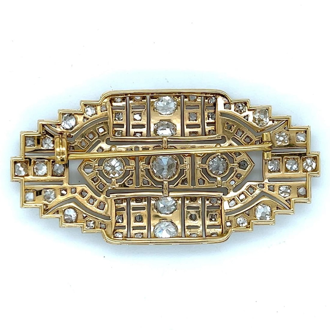 Elegant 18K Platinum 6.05 Ct Diamond Brooch with 106 Diamonds: Elegant 18K Platinum 6.05 Ct Diamond Brooch with 106 Diamonds This exquisite 18K and Platinum brooch features a stunning 6.05 ct. total diamond weight. The centerpiece is adorned with an approximately
