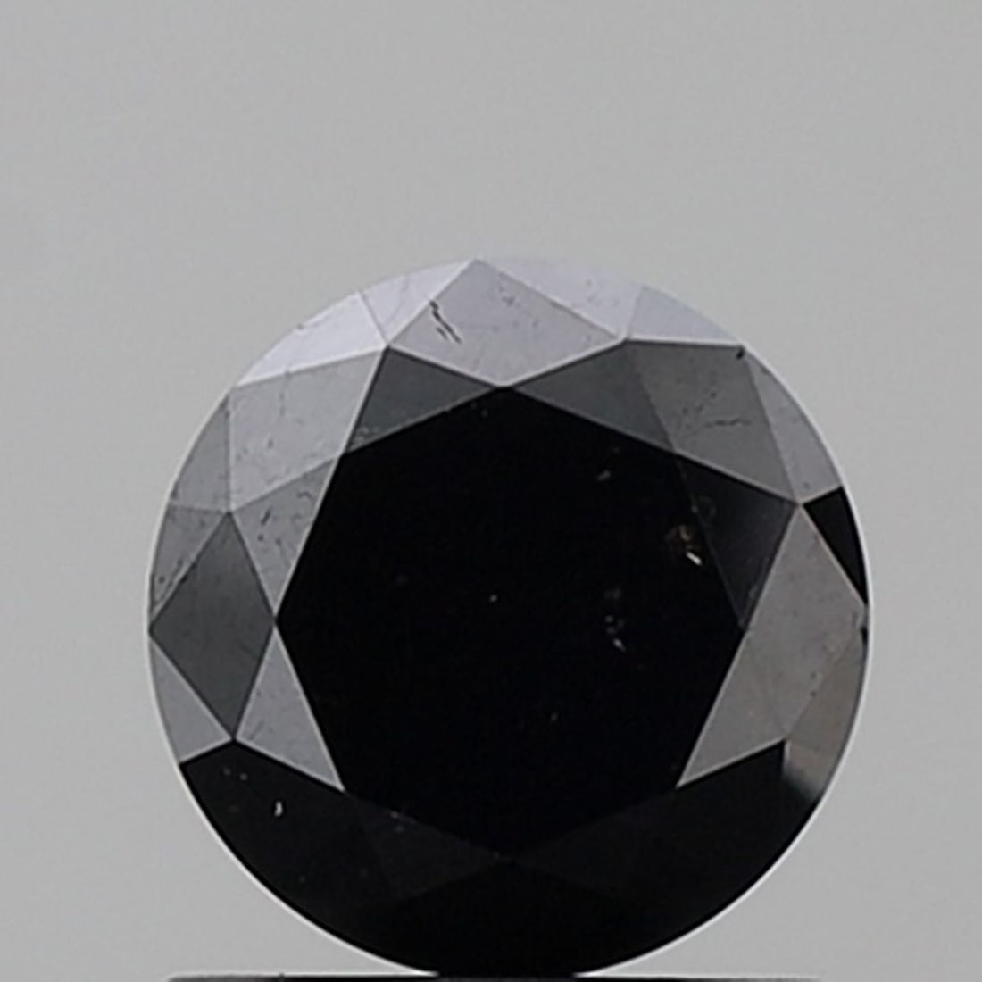 Loose Diamond - ROUND 1.28ct Black VVS2: Loose Diamond - ROUND 1.28ct Black VVS2 Source: Natural Shape: ROUND Carats: 1.28 Color: Black Certification: NONE Video: