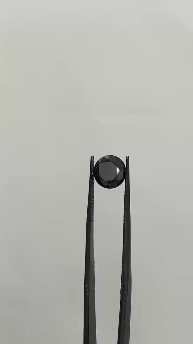 Loose Diamond - ROUND 1.9ct Fancy Black VVS2: Loose Diamond - ROUND 1.9ct Fancy Black VVS2 Source: Natural Shape: ROUND Carats: 1.9 Color: Fancy Black Certification: GIA Video: