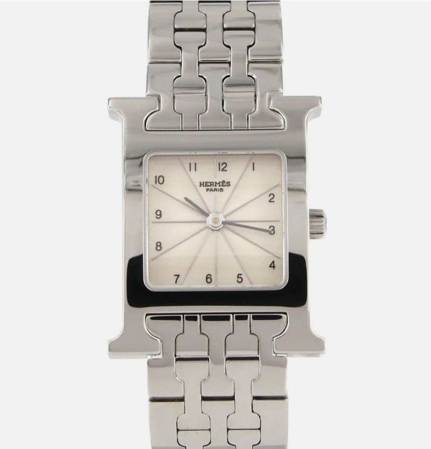 Hermes Heure H Ladies Stainless Steel Bracelet Ivory Dial HH1.210: Hermes Heure H Ladies Stainless Steel Bracelet Ivory Dial HH1.210 This Hermes Heure H ladies' watch features an ivory dial with Arabic numerals, complemented by a smooth bezel and a stainless steel br