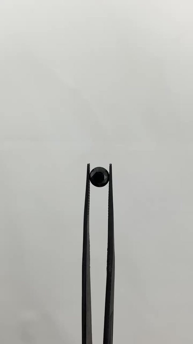 Loose Diamond - ROUND 1.02ct Fancy Black VVS2: Loose Diamond - ROUND 1.02ct Fancy Black VVS2 Source: Natural Shape: ROUND Carats: 1.02 Color: Fancy Black Certification: GIA Video: