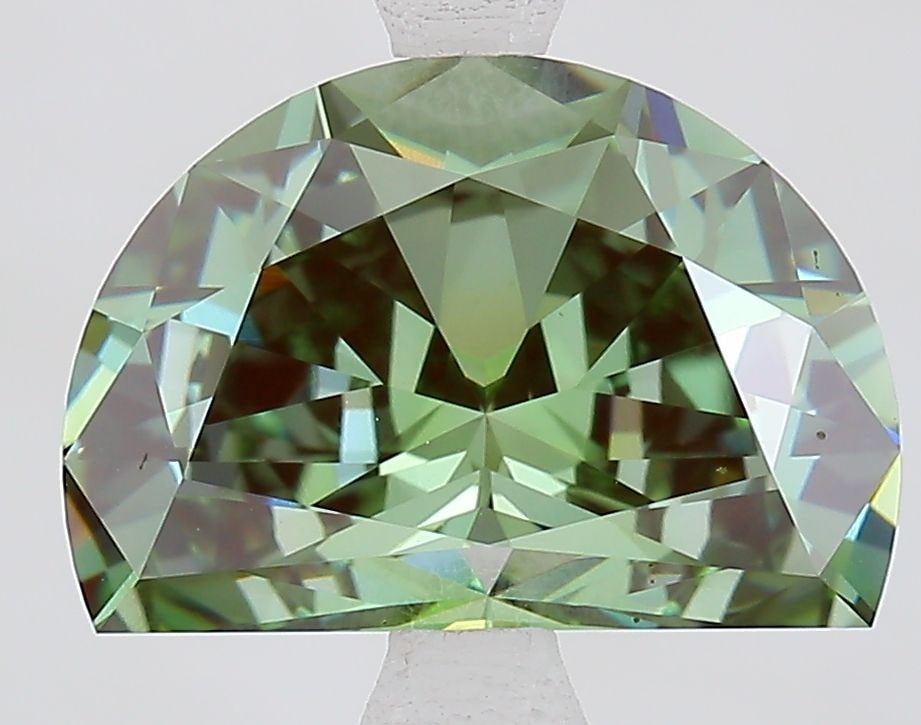 Loose Diamond - HALF MOON 3.31ct Fancy Vivid Green VVS2: Loose Diamond - HALF MOON 3.31ct Fancy Vivid Green VVS2 Source: This is a real non-mined Diamond that has been grown in a lab Shape: HALF MOON Carats: 3.31 Color: Fancy Vivid Green Certification: IGI