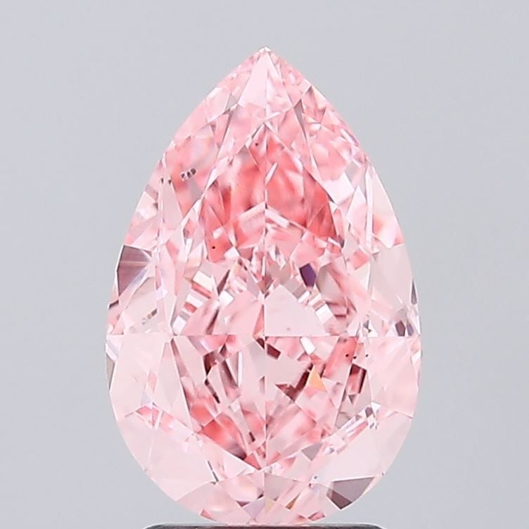 Loose Diamond - PEAR 3.21ct Fancy Vivid Pink VS2: Loose Diamond - PEAR 3.21ct Fancy Vivid Pink VS2 Source: This is a real non-mined Diamond that has been grown in a lab Shape: PEAR Carats: 3.21 Color: Fancy Vivid Pink Certification: IGI Video: Video