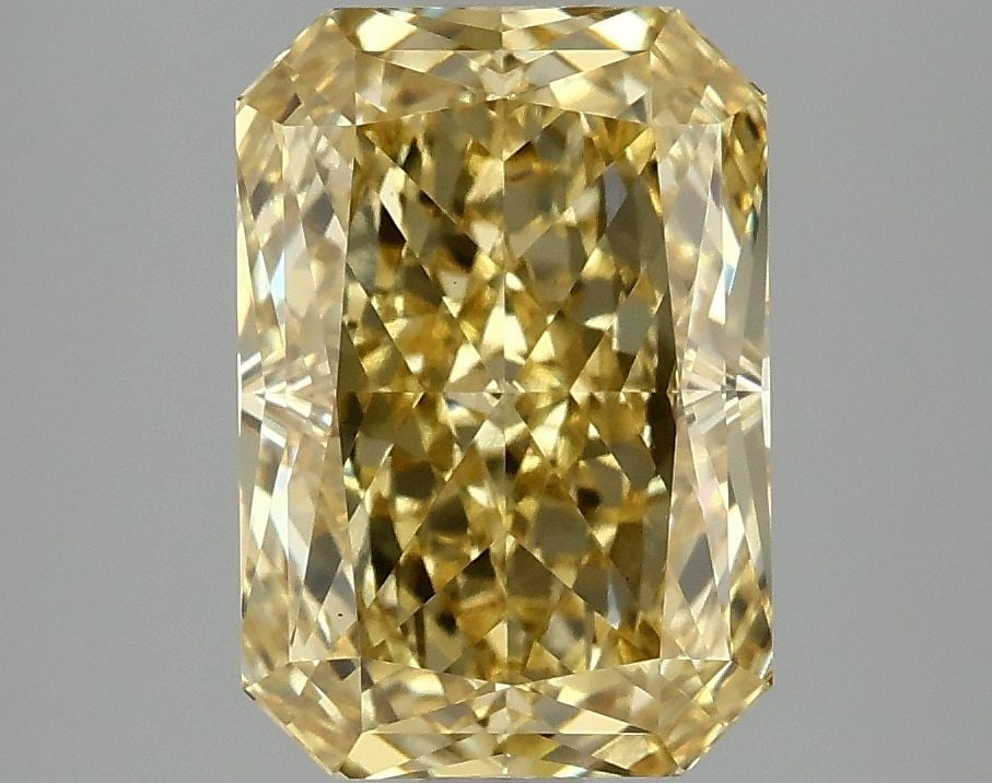 Loose Diamond - RADIANT 3.1ct Fancy Vivid Yellow VS1: Loose Diamond - RADIANT 3.1ct Fancy Vivid Yellow VS1 Source: This is a real non-mined Diamond that has been grown in a lab Shape: RADIANT Carats: 3.1 Color: Fancy Vivid Yellow Certification: IGI