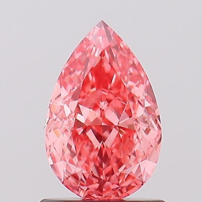 Loose Diamond - PEAR 1.07ct Fancy Vivid Pink VS1: Loose Diamond - PEAR 1.07ct Fancy Vivid Pink VS1 Source: This is a real non-mined Diamond that has been grown in a lab Shape: PEAR Carats: 1.07 Color: Fancy Vivid Pink Certification: IGI Video: Video