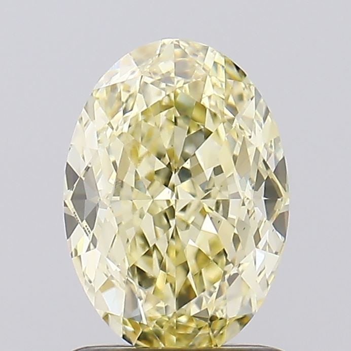 Loose Diamond - OVAL 1.53ct Fancy Yellow VS1: Loose Diamond - OVAL 1.53ct Fancy Yellow VS1 Source: This is a real non-mined Diamond that has been grown in a lab Shape: OVAL Carats: 1.53 Color: Fancy Yellow Certification: IGI Video:
