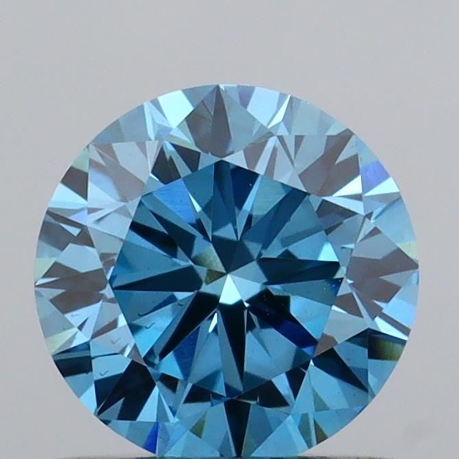 Loose Diamond - ROUND 0.85ct Fancy Vivid Blue VS1: Loose Diamond - ROUND 0.85ct Fancy Vivid Blue VS1 Source: This is a real non-mined Diamond that has been grown in a lab Shape: ROUND Carats: 0.85 Color: Fancy Vivid Blue Certification: IGI Video: