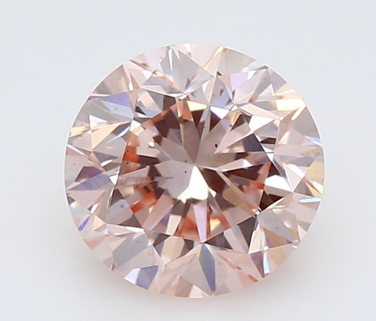 Loose Diamond - ROUND 0.98ct Fancy Pink VS2: Loose Diamond - ROUND 0.98ct Fancy Pink VS2 Source: This is a real non-mined Diamond that has been grown in a lab Shape: ROUND Carats: 0.98 Color: Fancy Pink Certification: IGI Video:
