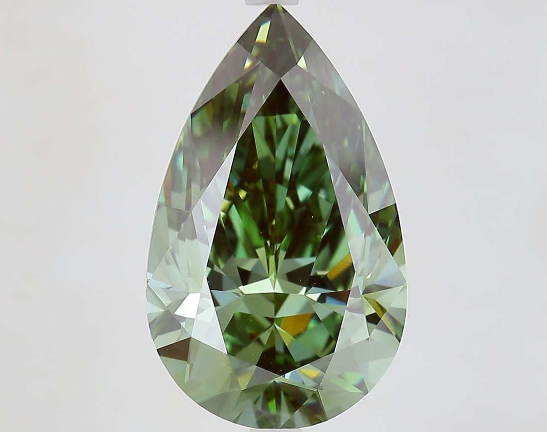 Loose Diamond - PEAR 7.01ct Fancy Vivid Green VVS2: Loose Diamond - PEAR 7.01ct Fancy Vivid Green VVS2 Source: This is a real non-mined Diamond that has been grown in a lab Shape: PEAR Carats: 7.01 Color: Fancy Vivid Green Certification: IGI Video: