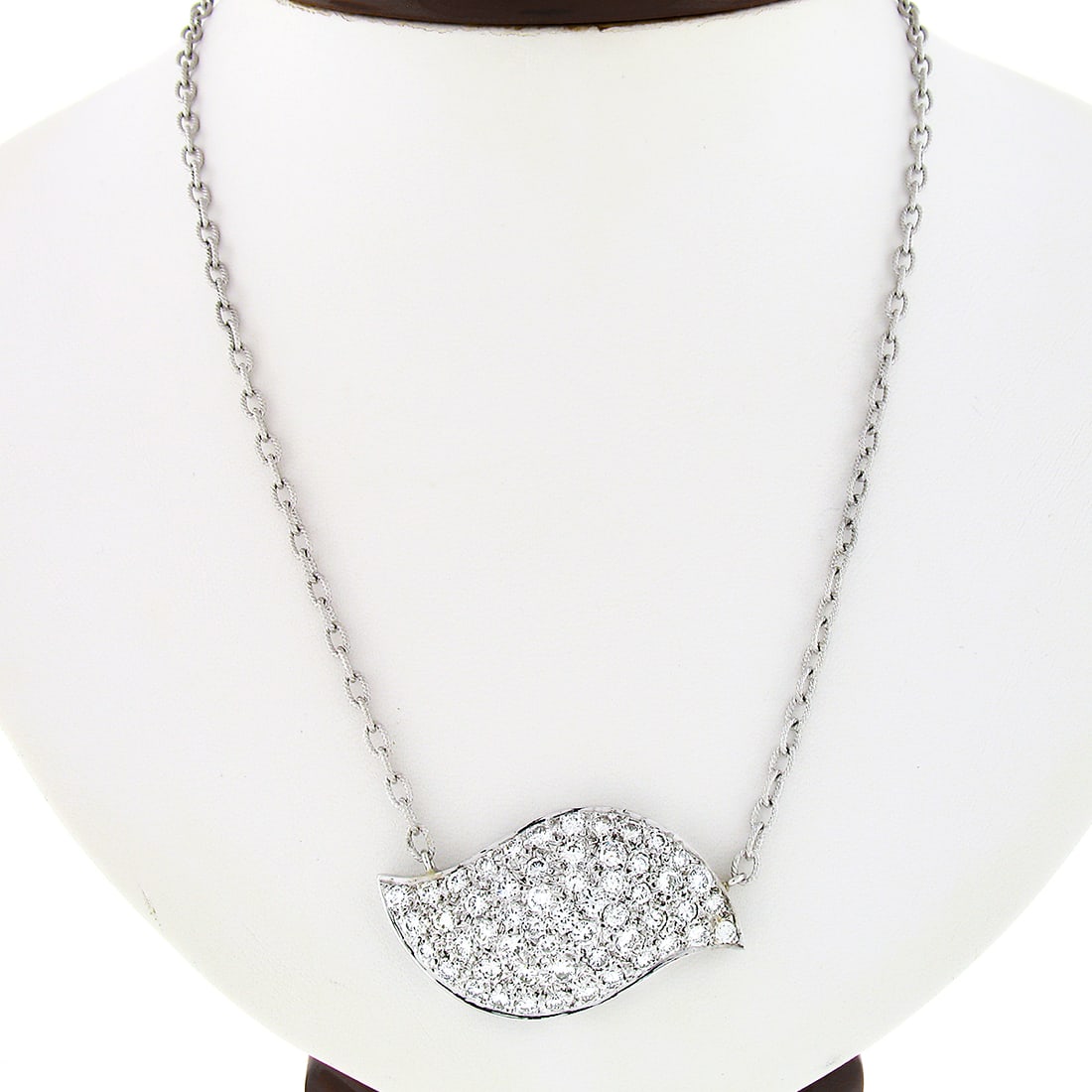 Vintage 14K White Gold 4.25ctw Diamond Cluster Pendant Necklace: Vintage 14K White Gold 4.25ctw Diamond Cluster Pendant Necklace This exquisite vintage pendant necklace is crafted from solid 14K white gold and features a stunning cluster of 54 round brilliant cut