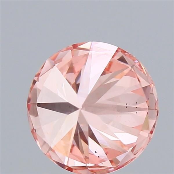 Loose Diamond - ROUND 2.02ct Fancy Vivid Pink VS1: Loose Diamond - ROUND 2.02ct Fancy Vivid Pink VS1 Source: This is a real non-mined Diamond that has been grown in a lab Shape: ROUND Carats: 2.02 Color: Fancy Vivid Pink Certification: IGI Video: