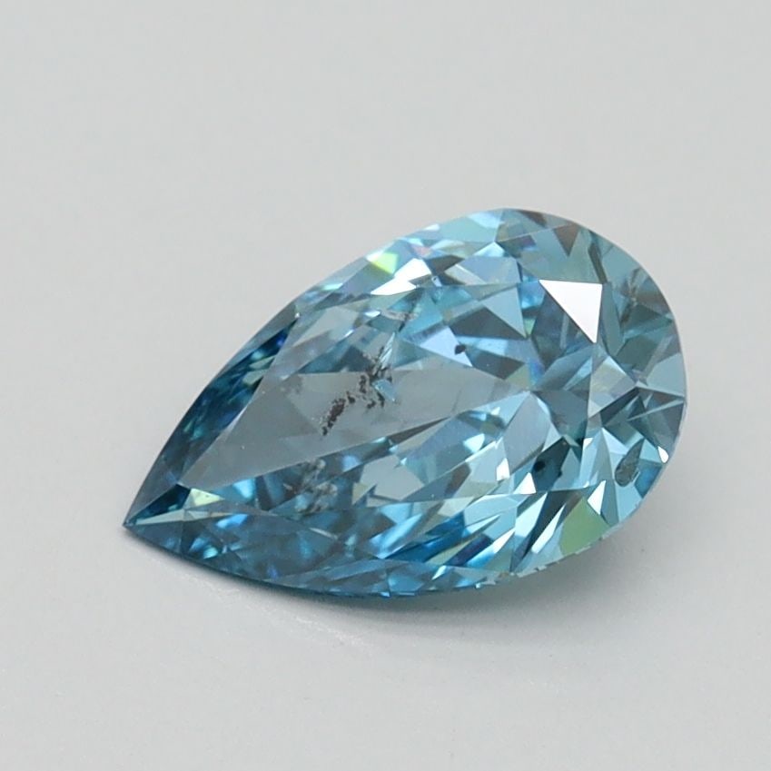 Loose Diamond - PEAR 0.91ct Fancy Vivid Blue SI2: Loose Diamond - PEAR 0.91ct Fancy Vivid Blue SI2 Source: This is a real non-mined Diamond that has been grown in a lab Shape: PEAR Carats: 0.91 Color: Fancy Vivid Blue Certification: IGI Video: Video