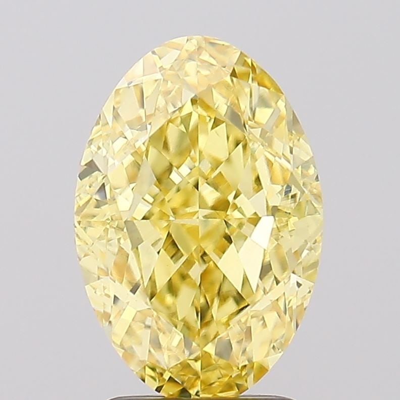Loose Diamond - OVAL 3.03ct Fancy Vivid Yellow VVS2: Loose Diamond - OVAL 3.03ct Fancy Vivid Yellow VVS2 Source: This is a real non-mined Diamond that has been grown in a lab Shape: OVAL Carats: 3.03 Color: Fancy Vivid Yellow Certification: IGI Video: