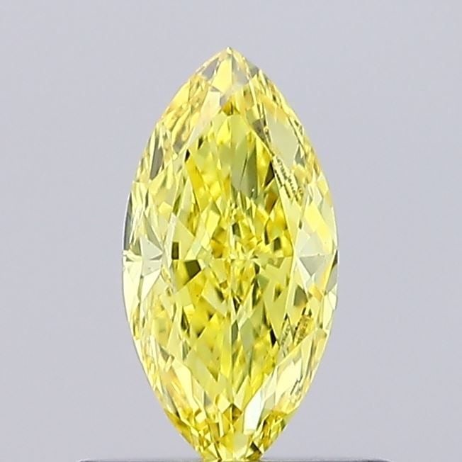 Loose Diamond - MARQUISE 0.44ct Fancy Vivid Yellow VS2: Loose Diamond - MARQUISE 0.44ct Fancy Vivid Yellow VS2 Source: This is a real non-mined Diamond that has been grown in a lab Shape: MARQUISE Carats: 0.44 Color: Fancy Vivid Yellow Certification: IGI