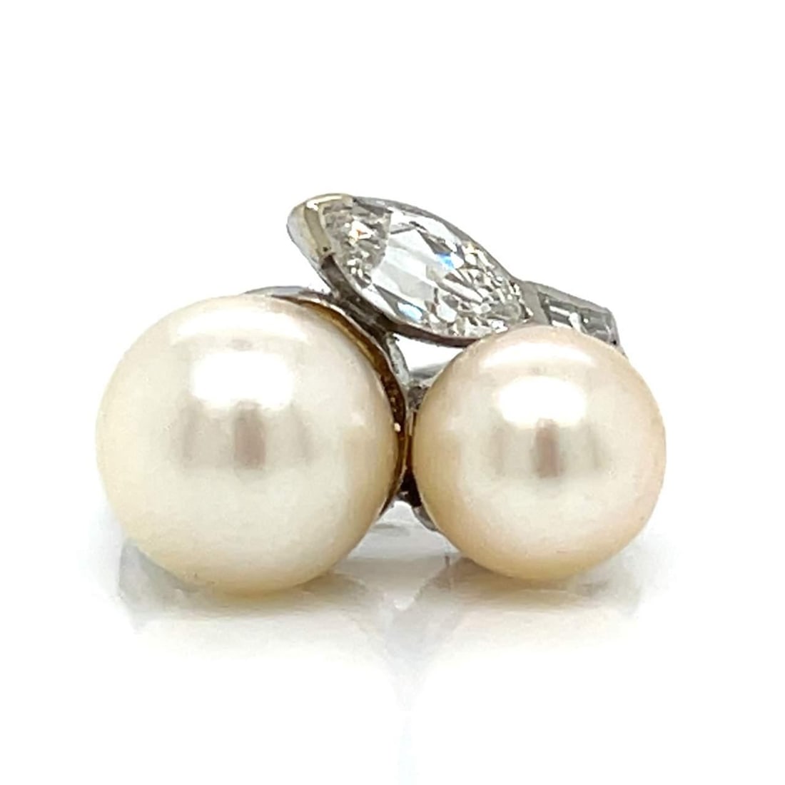 Vintage 1950's Platinum Pearl Diamond Ring Marquise 0.65 Ct: Vintage 1950's Platinum Pearl Diamond Ring Marquise 0.65 Ct This exquisite 1950's Platinum Pearl & Diamond Ring showcases a stunning design featuring a central marquise diamond weighing approximately