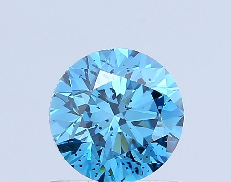 Loose Diamond - ROUND 0.81ct Fancy Vivid Blue SI2: Loose Diamond - ROUND 0.81ct Fancy Vivid Blue SI2 Source: This is a real non-mined Diamond that has been grown in a lab Shape: ROUND Carats: 0.81 Color: Fancy Vivid Blue Certification: NONE Video: