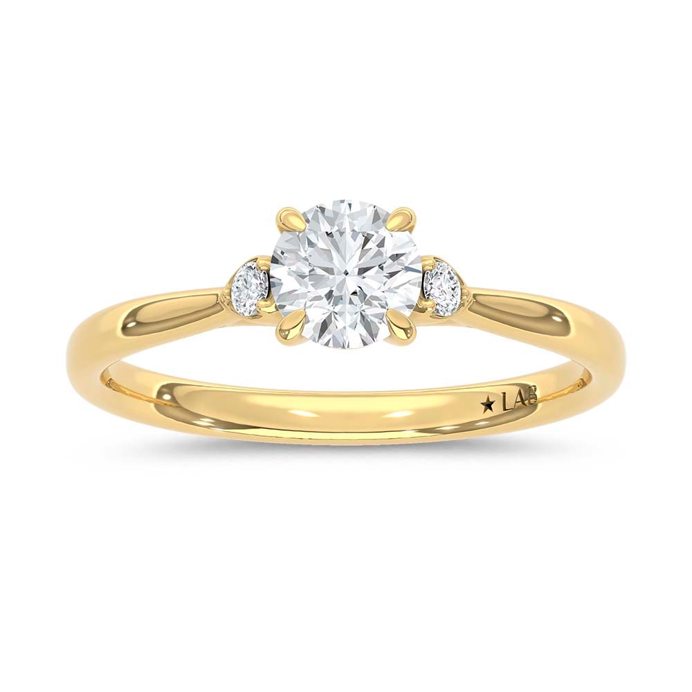 10K Yellow Gold Lab Grown Diamond 1/2 Ct.Tw. Promise Ring: 10K Yellow Gold Lab Grown Diamond 1/2 Ct.Tw. Promise Ring Celebrate love, commitment, and meaningful moments with this elegant lab-grown diamond promise ring, crafted in radiant 10K Yellow gold. Featu