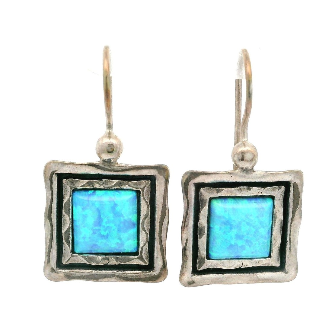 Sterling Silver Opal Dangle Earrings with Hammered Square Frames: Sterling Silver Opal Dangle Earrings with Hammered Square Frames These vintage drop earrings feature square cabochon synthetic opals set in hammered sterling silver frames. The opals display blue, gre