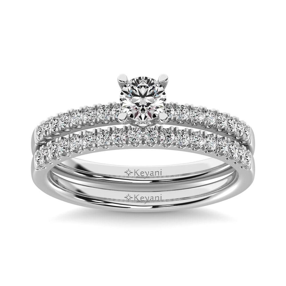 Diamond 3/4 Ct.Tw. Bridal Ring in 14K White Gold: Diamond 3/4 Ct.Tw. Bridal Ring in 14K White Gold 14k White Gold Stone Color: G-h Stone Clarity: Si2 Each ring is presented in standard size 6.5. Complimentary resizing is available between sizes 510 (