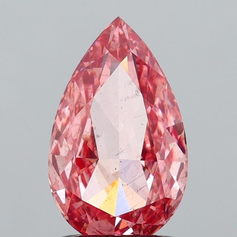 Loose Diamond - PEAR 1.54ct Fancy Vivid Pink SI2: Loose Diamond - PEAR 1.54ct Fancy Vivid Pink SI2 Source: This is a real non-mined Diamond that has been grown in a lab Shape: PEAR Carats: 1.54 Color: Fancy Vivid Pink Certification: IGI Video: Video