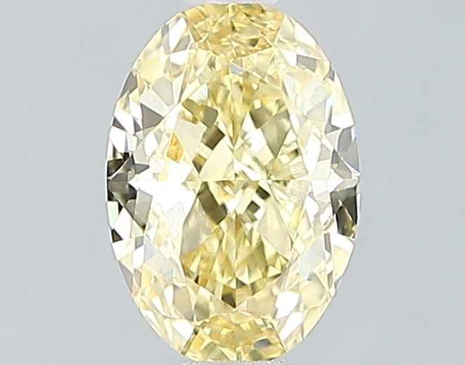 Loose Diamond - OVAL 1.06ct Fancy Vivid Yellow VS1: Loose Diamond - OVAL 1.06ct Fancy Vivid Yellow VS1 Source: This is a real non-mined Diamond that has been grown in a lab Shape: OVAL Carats: 1.06 Color: Fancy Vivid Yellow Certification: IGI Video: