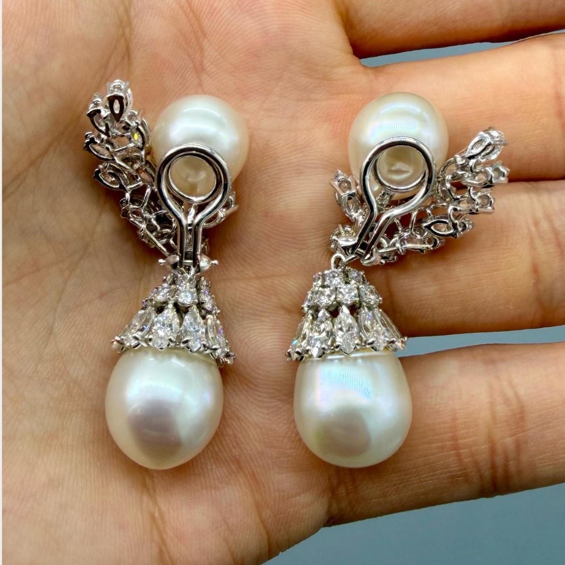 South Sea Pearl and Diamond Platinum Drop Earrings with Marquise and Round Stones: South Sea Pearl and Diamond Platinum Drop Earrings with Marquise and Round Stones These platinum earrings feature four South Sea pearls measuring between 17.5mm and 12.0mm. Accented with 42 marquise d