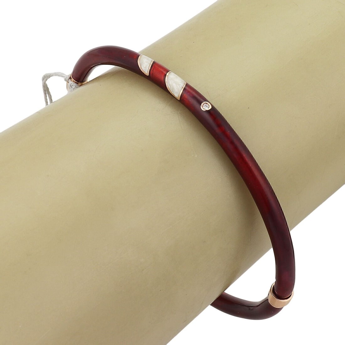 Nouvelle Bague 18k Gold Sterling Silver Enamel Bangle Bracelet: Nouvelle Bague 18k Gold Sterling Silver Enamel Bangle Bracelet This authentic Nouvelle Bague bangle bracelet features a striking combination of 18k pink gold, sterling silver, and vibrant red and whit